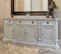 Front view of full credenza showing painted finish, marble top, drawers and doors closed