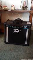 Front view of Peavey Rage 158 amplifier showing overall design and logo
