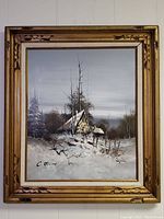 Full view of the framed winter scenery oil painting by C. Erwin.