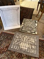 Three original pen and ink artworks by Bernard Laurie displayed on carpet and tile floor, showing overall condition and white borders.