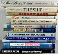 Stack of 11 books on seafaring topics showing titles and authors