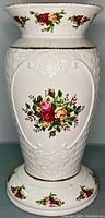 Front view of Royal Albert Old Country Roses Montrose vase showing floral details, embossed texture, and gold accents.