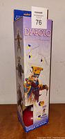 Photo of unopened Cirque Du Soleil branded Diabolo juggling set in colorful box showing character with diabolo and two sticks.