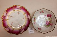 Top view of the Limoges platter and rose bowl showing their detailed floral designs and scalloped edges.