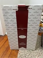 Box of Gevalia 8-cup automatic thermal carafe coffee maker with brand name and specifications.
