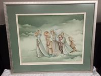 Framed lithograph showing seven stylized figures walking in flowing garments with a cloudy background.