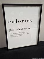 Photo of framed Calories definition poster showing the text and frame.