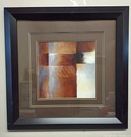 Front view of the framed modern abstract print showing full artwork and frame