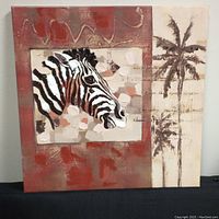 Front view of the vinyl canvas print featuring a zebra head and palm tree with an abstract background in reddish-brown and beige.