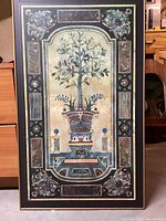 Frontal view of the lemon tree print, showing the entire laminated board with detailed decorative border and lemon tree in the center.