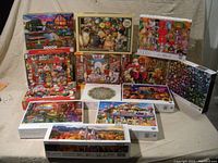 All puzzles laid out showing box art and titles, to verify count and condition