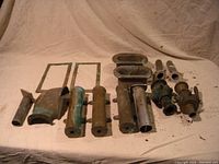 All items laid out showing frames, holders, scuppers and valves