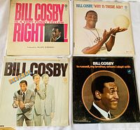 Four Bill Cosby vinyl album covers arranged in a square. Top left: 'Is A Very Funny Fellow Right!'. Top right: 'Why Is There Air?' with Bill Cosby juggling a globe. Bottom left: 'Revenge' showing Bill Cosby holding playing cards. Bottom right: 'To Russell, My Brother, Whom I Slept With' with Bill Cosby in profile.
