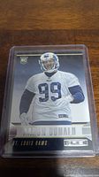 Front of Aaron Donald rookie football card in plastic sleeve.