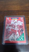 Front side of Barry Sanders rookie football card No. 494, showing action image of Sanders in Oklahoma State uniform numbered 21, labeled as 1989 Pro Set card and No. 1 draft pick.