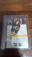 Front of signed Bobby Orr hockey card showing player image and signature