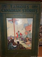 Cover of Famous Canadian Stories book in green cloth with illustrated panel showing historical scene with ship and people