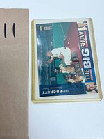 Top view of Kirby Puckett baseball card in protective sleeve showing front design and text details.