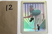 Front side of Randy Johnson baseball card showing holographic background and pitching pose