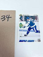 Close-up image of one Upper Deck Wendel Clark hockey card showing the player skating during a game.