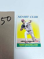Front view of 1991 Score baseball card featuring Terry Mulholland pitching, with 'No-Hit Club' text and game date details.