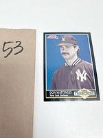 Two 1991 Score baseball cards featuring Don Mattingly of the New York Yankees. Each card shows Don Mattingly in a Yankees cap and jacket with a mustache, part of 'The Franchise' series.