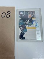 Front side of the Paul Kariya hockey card showing the player mid-skate in Mighty Ducks uniform with number 9 and SE Edition branding.
