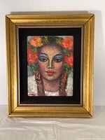 Full view of framed oil painting against a white background