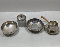 Front angle showing all five pieces in a row