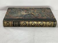 Bound volume spine and marbled boards laid flat
