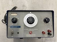 Front view of the Krohn-Hite KH 430-AB audio oscillator showing all control knobs, power switch, and output terminal connections.