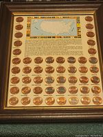 Image showing the full framed coin set with all quarters surrounding a USA map and text description.