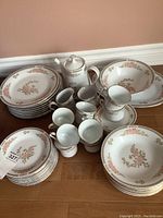 Full set of Fairfield china arranged showing plates, bowls, cups and serving pieces