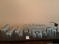 Full view of all the glasses arranged in multiple rows on the table