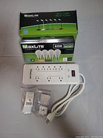 MaxLite LED bulbs, LED desk lamp, power strip, mounting hardware