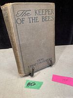 Front cover of the hardcover book showing title, author, and signs of wear.