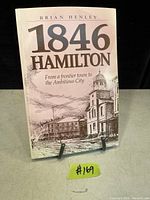 Front cover of the book titled '1846 Hamilton by Brian Henley' with illustration of a historic town scene.