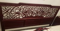Full front view of the headboard leaning against wall