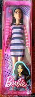 Photo of Barbie Fashionista Doll #147 in original packaging, showing doll and packaging details.
