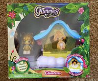 Front view of boxed Glimmies Glimtern lantern toy with exclusive character inside, showing colorful packaging and details of product features.