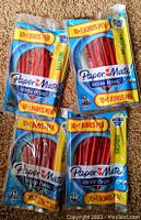 Four unopened packs of PaperMate Write Bros red ballpoint pens, each pack containing 11 pens (10 pens plus 1 bonus pen).