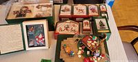 Complete set displayed with all figurines and boxes, showing arrangement of characters and accessories.