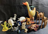 Photo showing the full collection of animal figurines from frogs and turtles to ducks, elephants, camels.