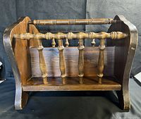 Front view showing wooden spindle design of the mid century rack.