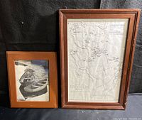Both framed prints shown together - map of Brooklin Maine and black and white photo of boats