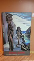 Full view of the large Emily Carr Gallery advertising print mounted on masonite board against a wall.