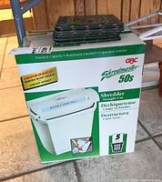 Photo of the GBC Shredmaster 50s shredder box, showing front with product image and features.