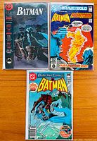Front cover photo showing three DC comics: Batman Annual #13 (1989) with a dark cityscape cover, Brave and the Bold #172 featuring Batman and Firestorm, and Detective Comics #505 showing Batman fighting a green creature under frozen water.