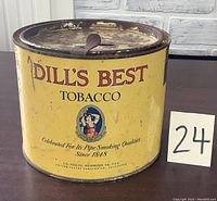 Front view of Dill's Best Tobacco tin showing main graphics and condition.