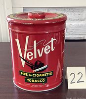Front side of the red Velvet tobacco can showing main branding and pipe & cigarette tobacco text.